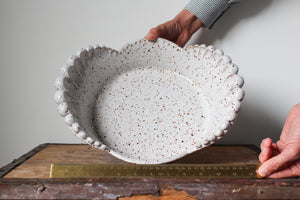 Scalloped Serving Dish in Speckled Creamy White