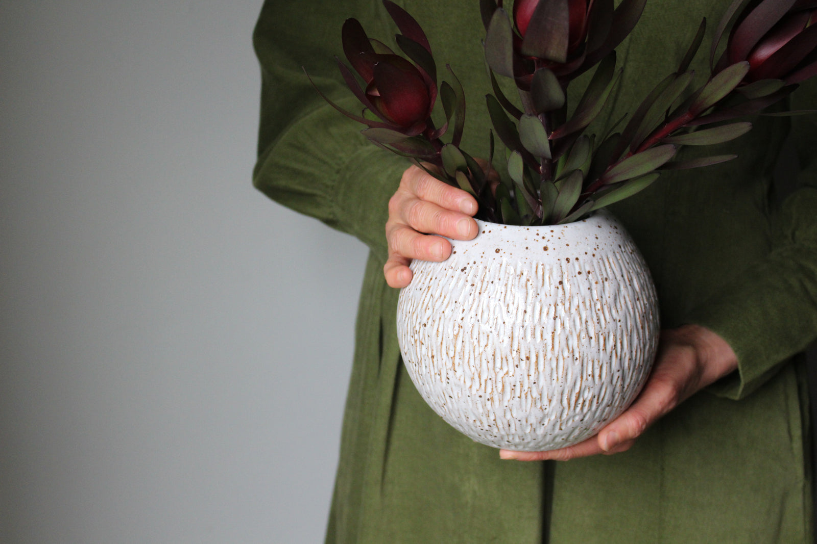 Carved Orb Vase in Speckled White