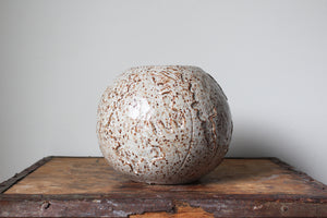 Slightly Flawed Carved Orb Vase
