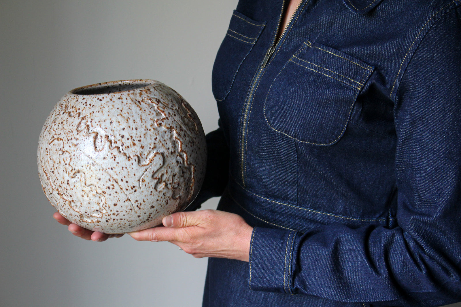 Slightly Flawed Carved Orb Vase